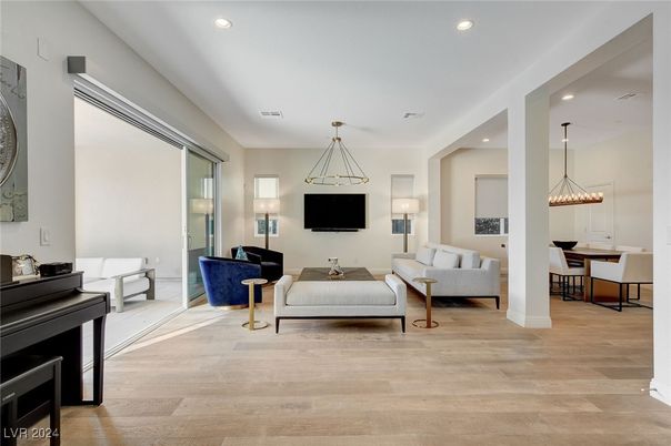 Dining room, Interior, Living room, Pendant Lights, Piano, Recessed Lighting, Wood Texture Flooring