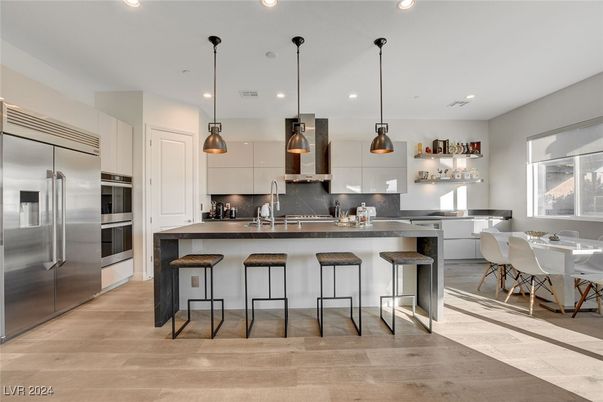 Dining room, Interior, Kitchen, Pendant Lights, Recessed Lighting, Stainless Steel Appliances, Wood Texture Flooring