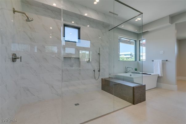 Bathroom, Free Standing Baths, Glass Shower, Interior, Marble Walls, Recessed Lighting