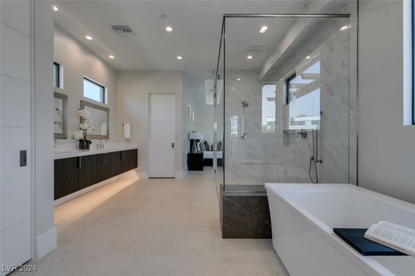 Bathroom, Dual Sink Vanities, Free Standing Baths, Glass Shower, Interior, Marble Walls, Recessed Lighting