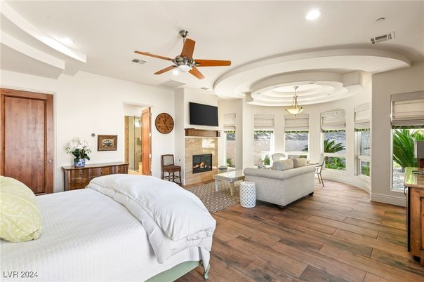 Bedroom, Fireplace, Interior, Living room, Pendant Lights, Recessed Lighting, Wood Texture Flooring