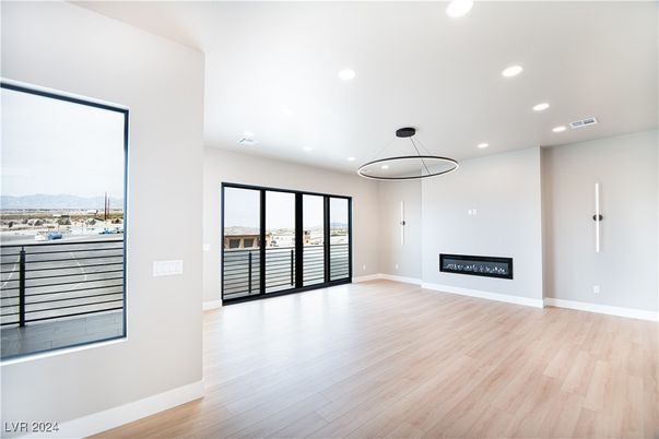 Empty room, Fireplace, Interior, Pendant Lights, Recessed Lighting, Wood Texture Flooring