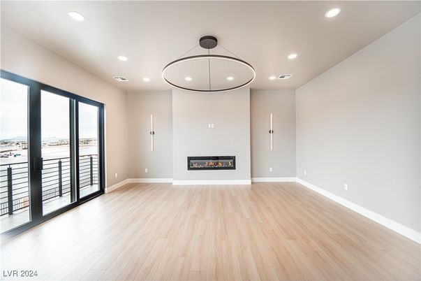 Empty room, Fireplace, Interior, Pendant Lights, Recessed Lighting, Wood Texture Flooring