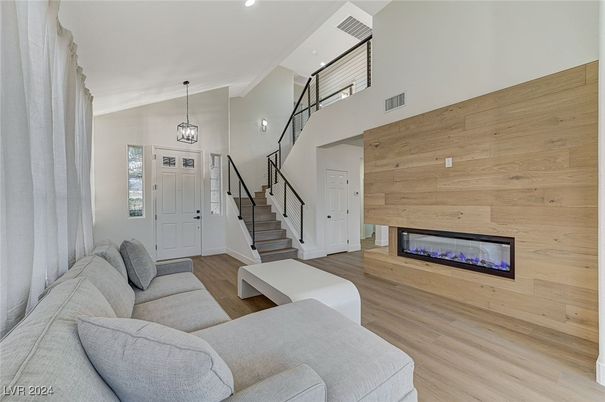 Fireplace, Interior, Living room, Pendant Lights, Recessed Lighting, Wood Texture Flooring, Wooden Walls