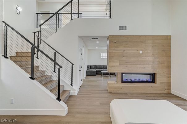 Fireplace, Interior, Recessed Lighting, Wood Texture Flooring, Wooden Walls