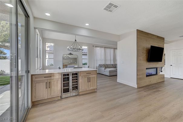 Dining room, Fireplace, Interior, Pendant Lights, Recessed Lighting, Wood Texture Flooring