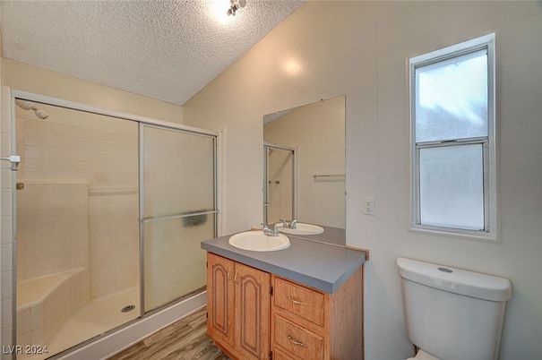 Bathroom, Dual Sink Vanities, Glass Shower, Interior, Wood Texture Flooring