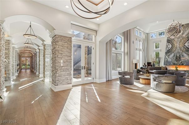 Fireplace, Interior, Living room, Pendant Lights, Recessed Lighting, Stone Walls, Wood Texture Flooring