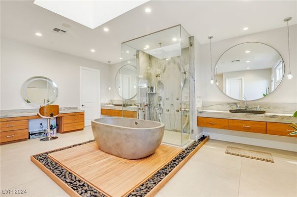 Bathroom, Dual Sink Vanities, Free Standing Baths, Glass Shower, Interior, Marble Walls, Recessed Lighting