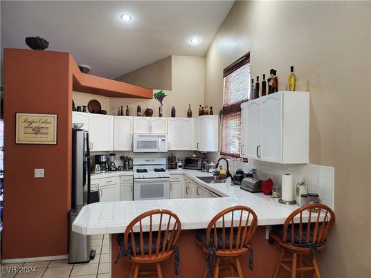 Interior, Kitchen, Recessed Lighting, Tile Countertops