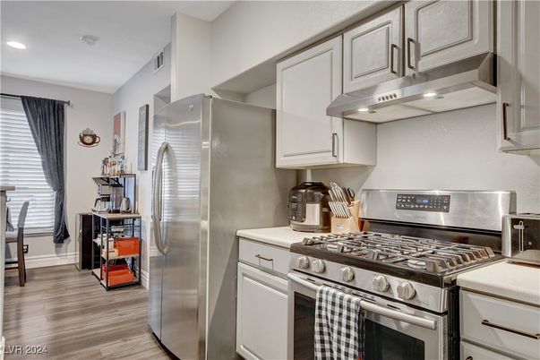Interior, Kitchen, Recessed Lighting, Stainless Steel Appliances, Wood Texture Flooring
