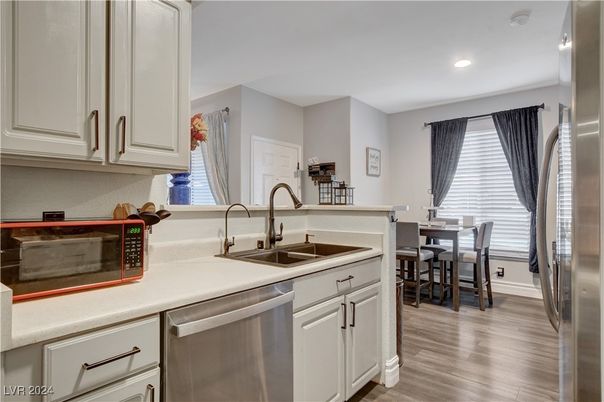 Dining room, Interior, Kitchen, Recessed Lighting, Stainless Steel Appliances, Wood Texture Flooring