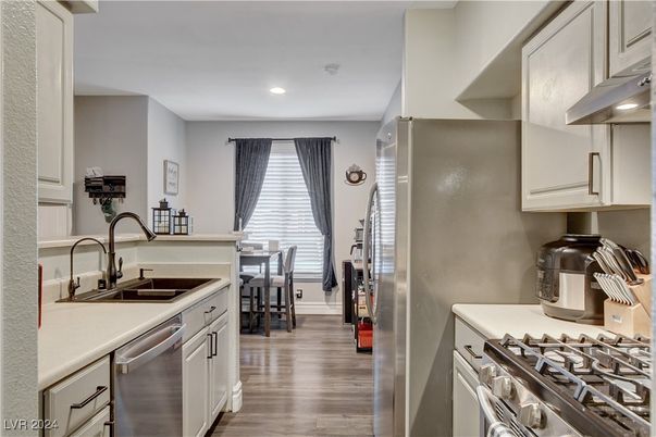 Dining room, Interior, Kitchen, Recessed Lighting, Stainless Steel Appliances, Wood Texture Flooring