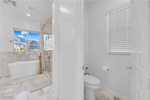 Bathroom, Free Standing Baths, Glass Shower, Interior, Marble, Marble Walls, Recessed Lighting