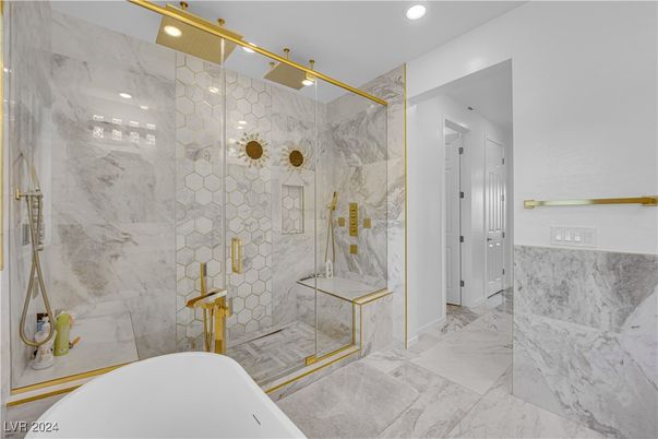 Bathroom, Free Standing Baths, Glass Shower, Interior, Marble, Marble Walls, Recessed Lighting