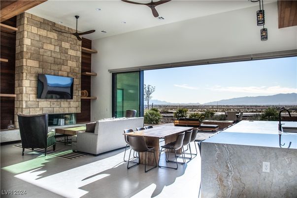Dining room, Fireplace, Interior, Kitchen, Living room, Recessed Lighting, Stone Walls
