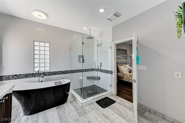 Bathroom, Bedroom, Free Standing Baths, Glass Shower, Interior, Recessed Lighting, Wood Texture Flooring
