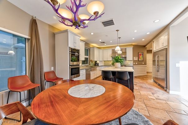 Chandelier, Dining room, Interior, Kitchen, Pendant Lights, Recessed Lighting, Stainless Steel Appliances