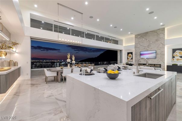 Dining room, Interior, Kitchen, Marble, Marble Walls, Pendant Lights, Recessed Lighting, Stainless Steel Appliances