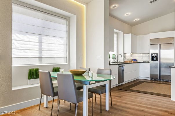Dining room, Interior, Kitchen, Recessed Lighting, Stainless Steel Appliances, Wood Texture Flooring