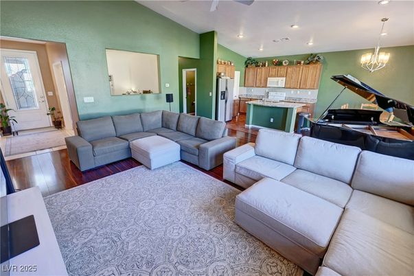 Chandelier, Interior, Kitchen, Living room, Pendant Lights, Piano, Recessed Lighting, Wood Texture Flooring