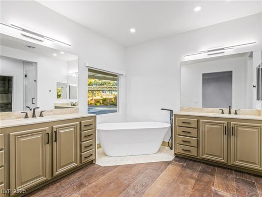 Bathroom, Dual Sink Vanities, Free Standing Baths, Glass Shower, Interior, Recessed Lighting, Wood Texture Flooring