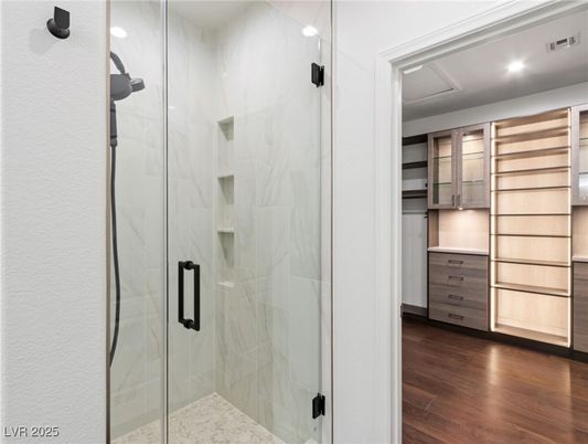 Bathroom, Glass Shower, Interior, Marble Walls, Recessed Lighting, Wood Texture Flooring