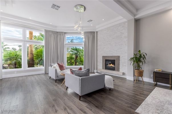 Fireplace, Interior, Living room, Pendant Lights, Recessed Lighting, Stone Walls, Wood Texture Flooring