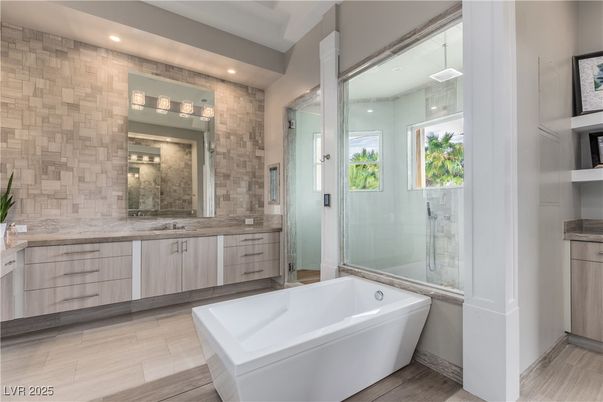 Bathroom, Dual Sink Vanities, Free Standing Baths, Glass Shower, Interior, Recessed Lighting, Wood Texture Flooring