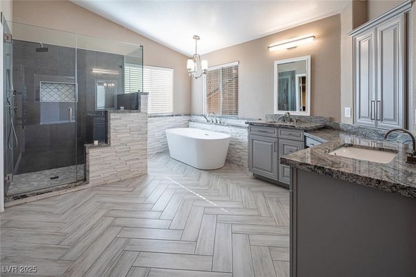 Bathroom, Dual Sink Vanities, Free Standing Baths, Glass Shower, Interior, Pendant Lights, Wood Texture Flooring
