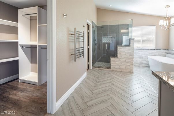 Bathroom, Free Standing Baths, Glass Shower, Interior, Pendant Lights, Recessed Lighting, Walk-in Closets, Wood Texture Flooring