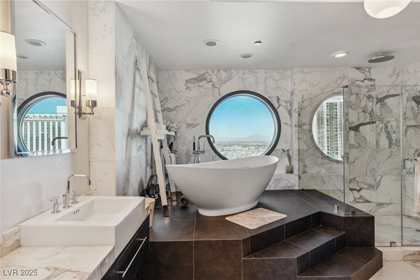 Bathroom, Dual Sink Vanities, Free Standing Baths, Glass Shower, Interior, Marble Walls, Recessed Lighting