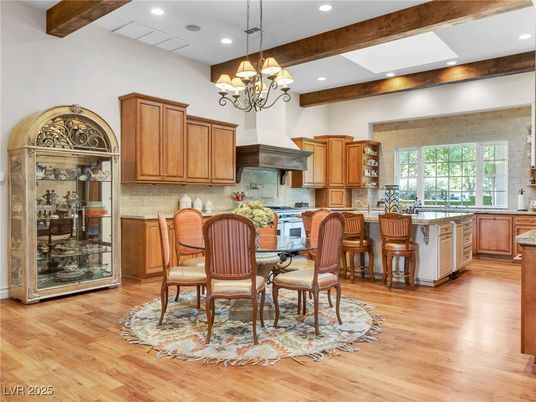 Chandelier, Dining room, Interior, Kitchen, Recessed Lighting, Stainless Steel Appliances, Wooden Beams, Wood Texture Flooring
