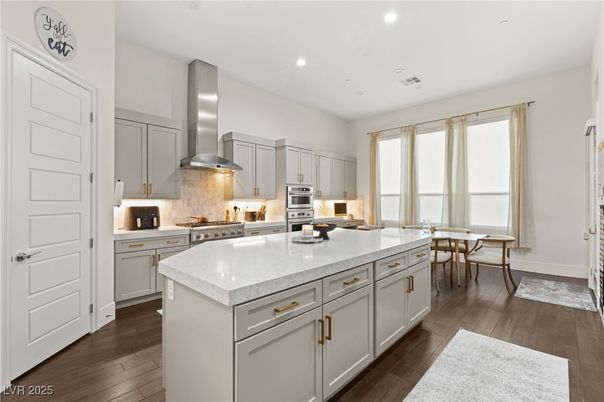 Dining room, Interior, Kitchen, Recessed Lighting, Stainless Steel Appliances, Wood Texture Flooring