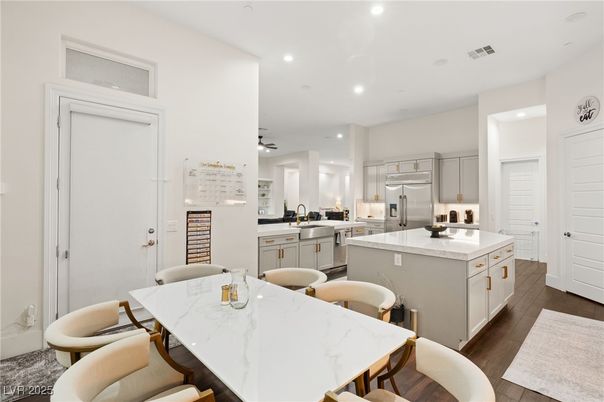 Dining room, Interior, Kitchen, Recessed Lighting, Stainless Steel Appliances, Wood Texture Flooring