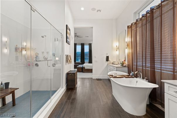Bathroom, Bedroom, Free Standing Baths, Glass Shower, Interior, Recessed Lighting, Wood Texture Flooring