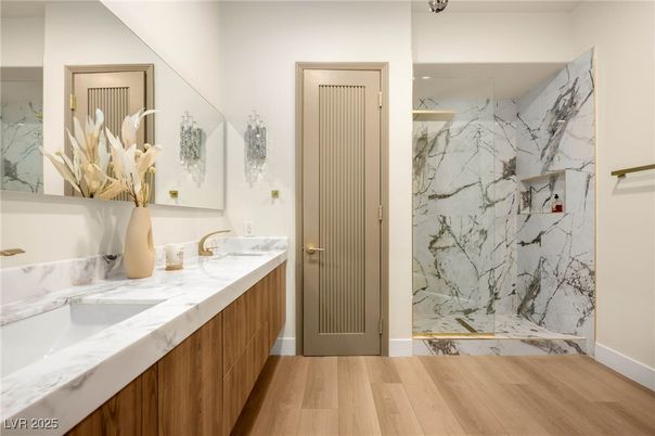Bathroom, Dual Sink Vanities, Interior, Marble Walls, Wood Texture Flooring