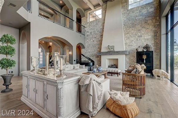Fireplace, Interior, Living room, Piano, Recessed Lighting, Stone Walls, Wood Texture Flooring