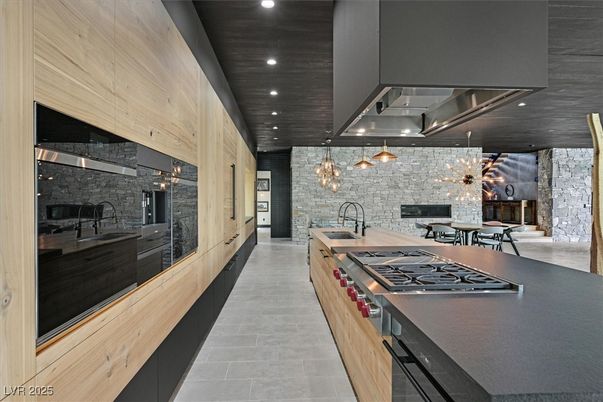 Interior, Kitchen, Pendant Lights, Recessed Lighting, Stainless Steel Appliances, Stone Walls