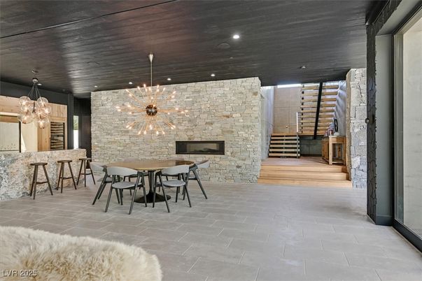 Dining room, Fireplace, Interior, Pendant Lights, Recessed Lighting, Stone Walls