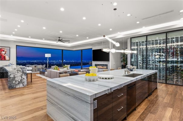 Dining room, Fireplace, Interior, Kitchen, Living room, Pendant Lights, Recessed Lighting, Wine Storage, Wood Texture Flooring