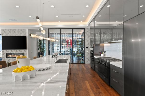 Fireplace, Interior, Kitchen, Pendant Lights, Recessed Lighting, Stainless Steel Appliances, Wood Texture Flooring