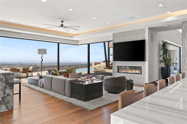 Dining room, Fireplace, Interior, Living room, Recessed Lighting, Water, Wood Texture Flooring