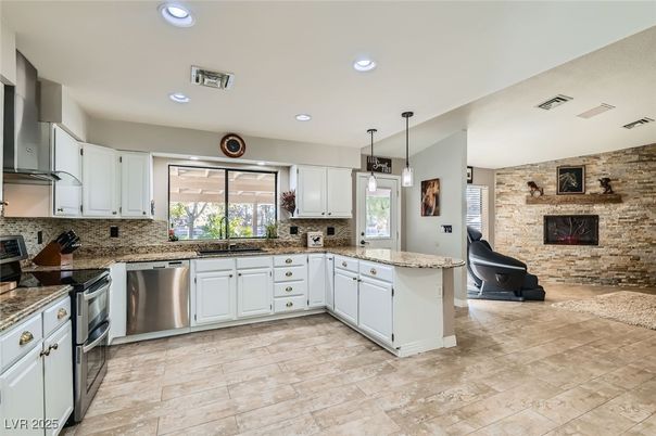 Interior, Kitchen, Pendant Lights, Recessed Lighting, Stainless Steel Appliances, Stone Walls