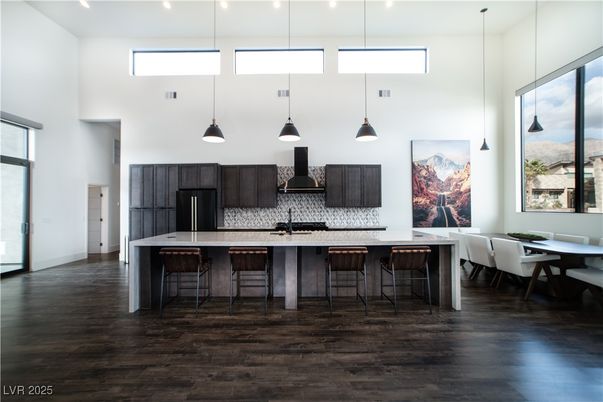 Dining room, Interior, Kitchen, Pendant Lights, Recessed Lighting, Stainless Steel Appliances, Wood Texture Flooring
