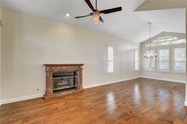 Chandelier, Empty room, Fireplace, Interior, Recessed Lighting, Wood Texture Flooring