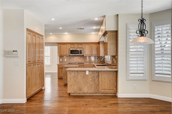 Interior, Kitchen, Pendant Lights, Recessed Lighting, Stainless Steel Appliances, Wood Texture Flooring