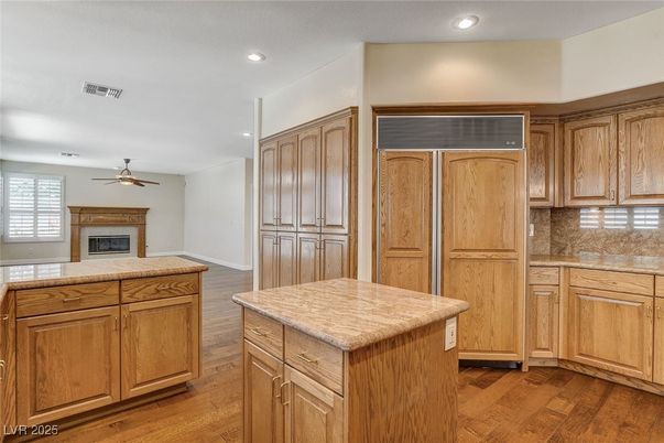 Fireplace, Interior, Kitchen, Recessed Lighting, Wood Texture Flooring
