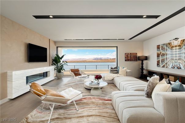Fireplace, Interior, Living room, Recessed Lighting, Water, Wood Texture Flooring