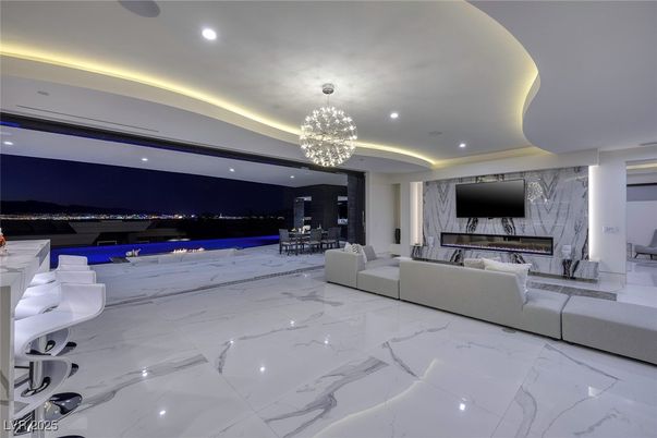 Dining room, Fireplace, Interior, Living room, Marble, Marble Walls, Pendant Lights, Recessed Lighting